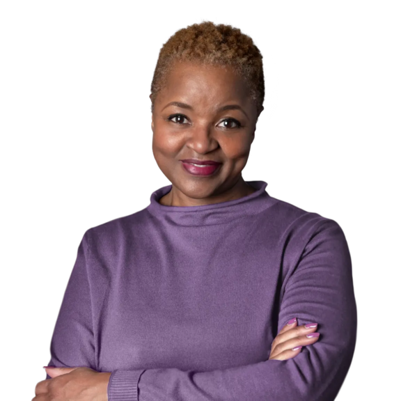 A woman standing with her arms crossed